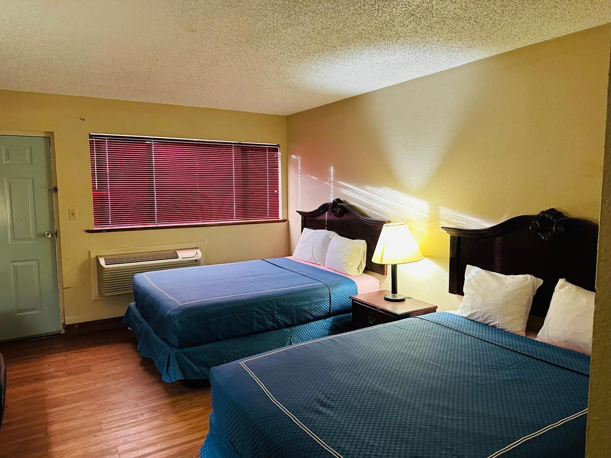 Warrick Plaza Inn Plainview Buitenkant foto